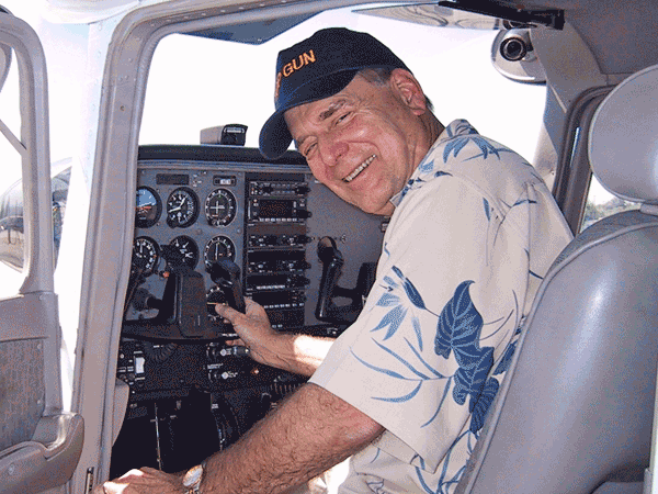Don Elliot at the cockpit controls